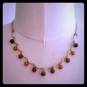 Amber colored beaded necklace